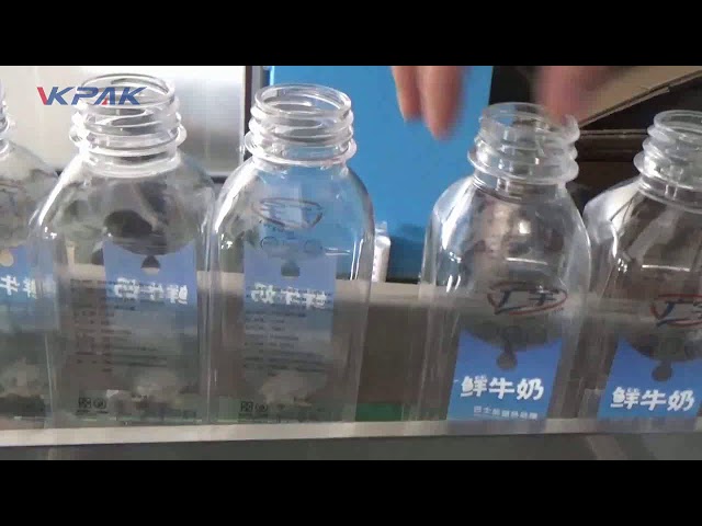 Automatische quadratische Flaschenetikettiermaschine aus doppelseitigem Kunststoff